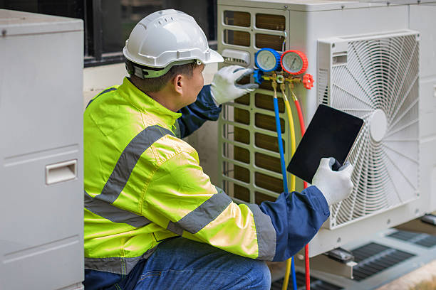 Professional Hvac Maintenance technician working in Round Hill, VA